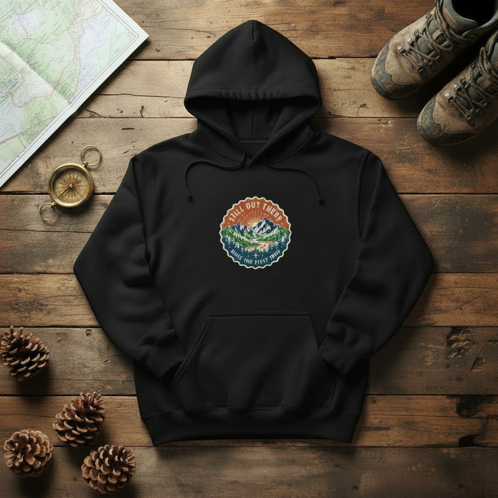 Black vintage mountain hoodie with front logo patch, kangaroo pocket, drawstring hood.