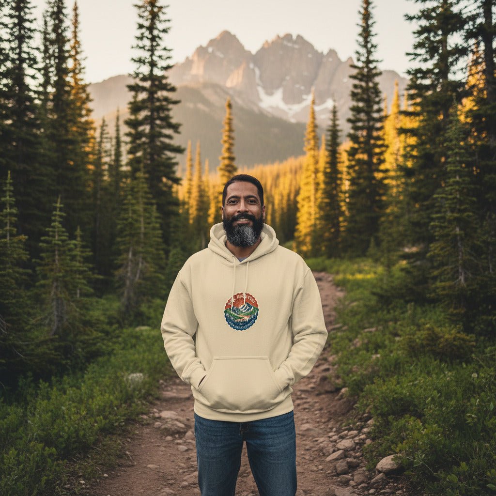 Sand mountain hoodie on model with front logo patch, drawstring hood, kangaroo pocket.