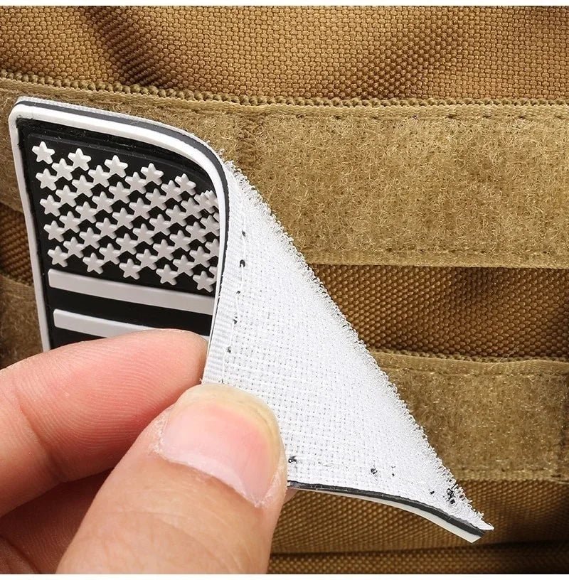 White-edged patch with star pattern on tan MOLLE backpack panel