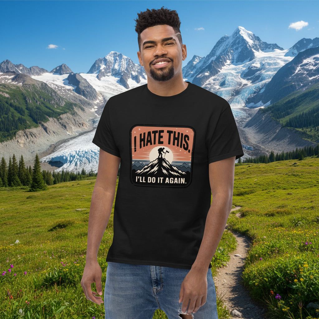 Black hiking T-shirt with front logo patch and mountain silhouette print.