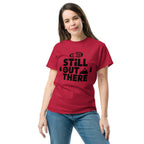 Red hiking T-shirt with black "Still Out There" logo graphic on the chest