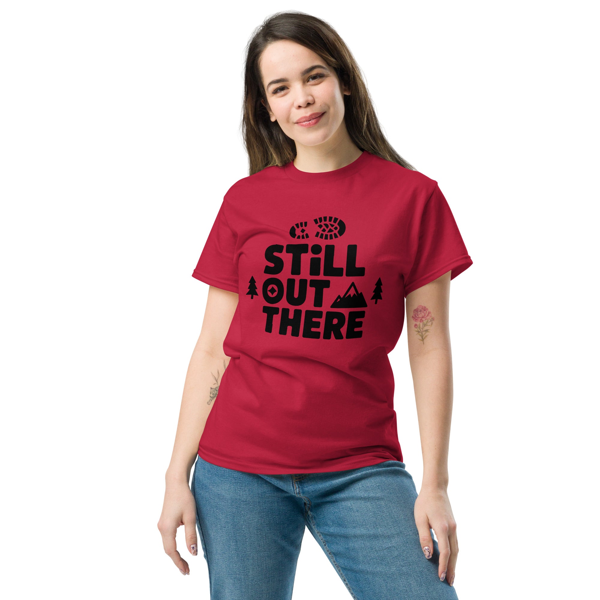 Red hiking T-shirt with black "Still Out There" logo graphic on the chest