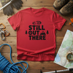 Red crewneck hiking T-shirt with black “STILL OUT THERE” logo and mountain trees