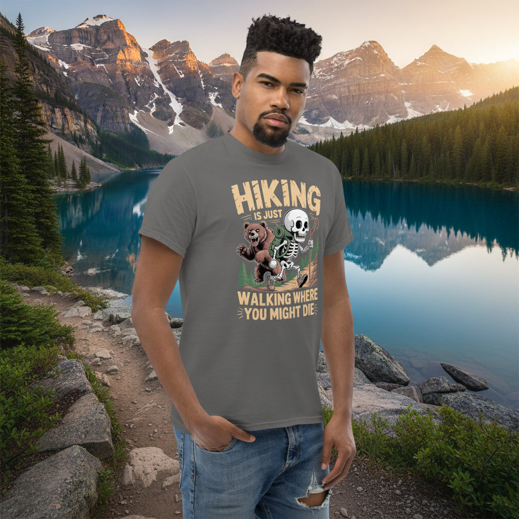 Charcoal gray hiking T-shirt on model with skull-and-forest front graphic and text