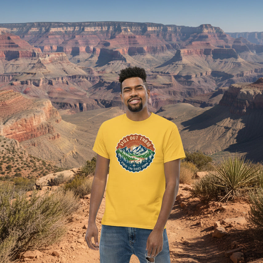 Mustard yellow T-shirt with a circular trail badge graphic on the chest.