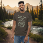 Man wearing a brown t-shirt with 'Keep the Trail' graphic design on a white background