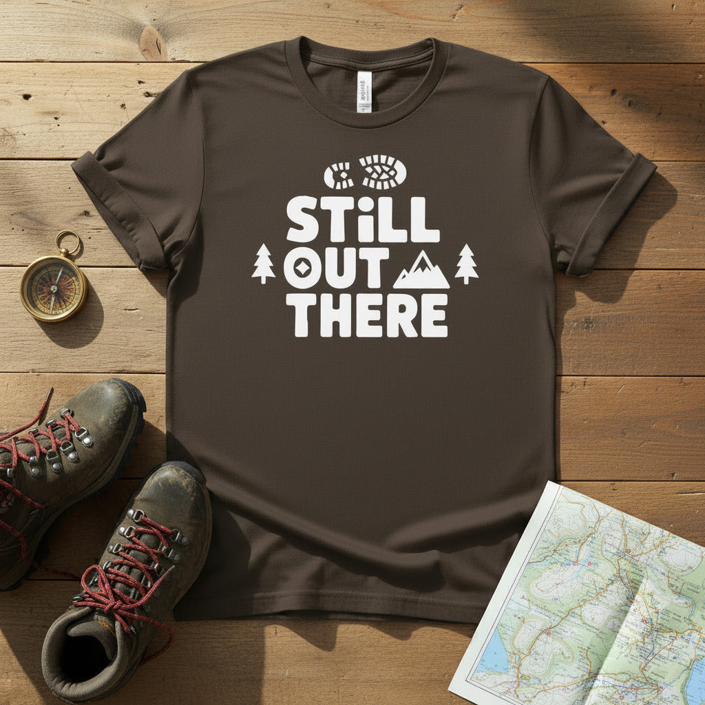 Dark brown hiking T-shirt with white Still Out There logo and tree icons.