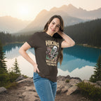 Dark brown hiking T-shirt on model with skull-and-forest front graphic and text