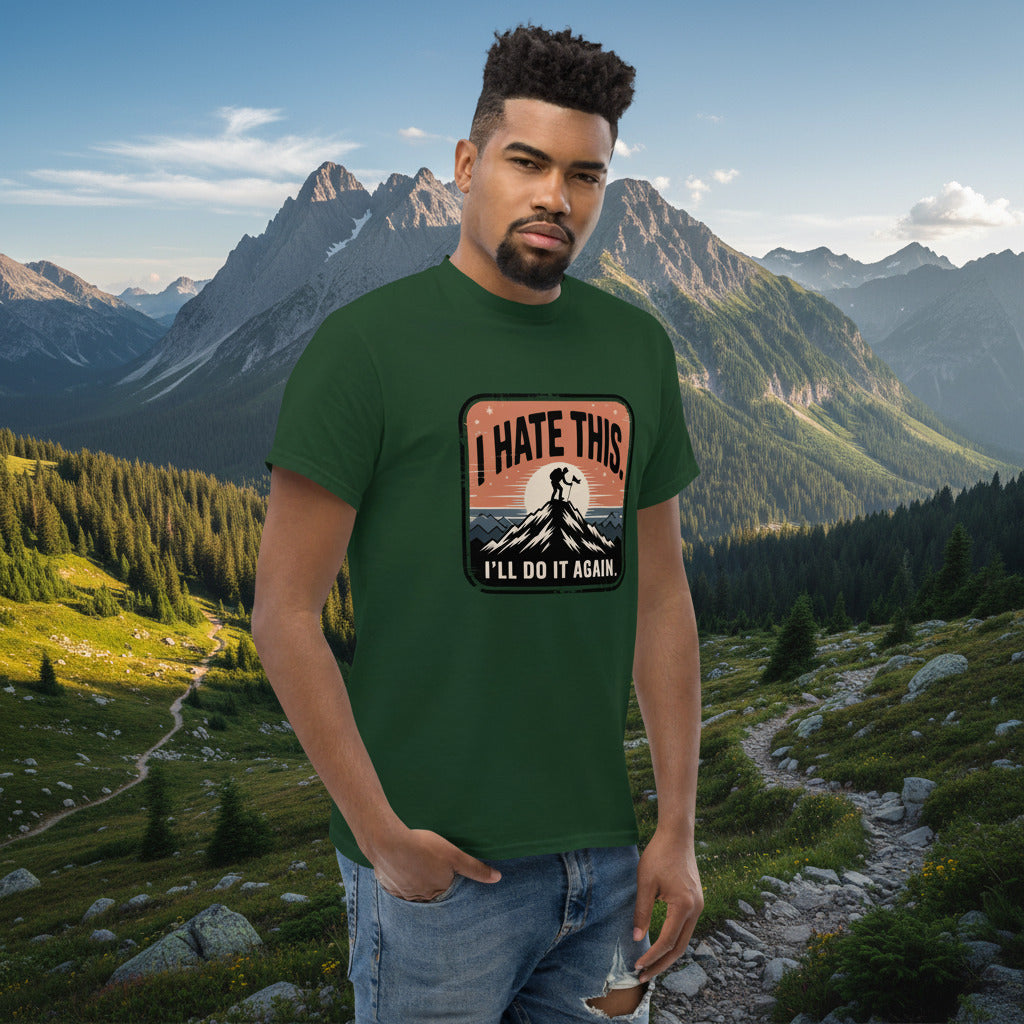 Forest green hiking T-shirt with centered chest logo patch and mountain silhouette.