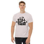 Light gray hiking T-shirt with black "Still Out There" logo graphic on the chest