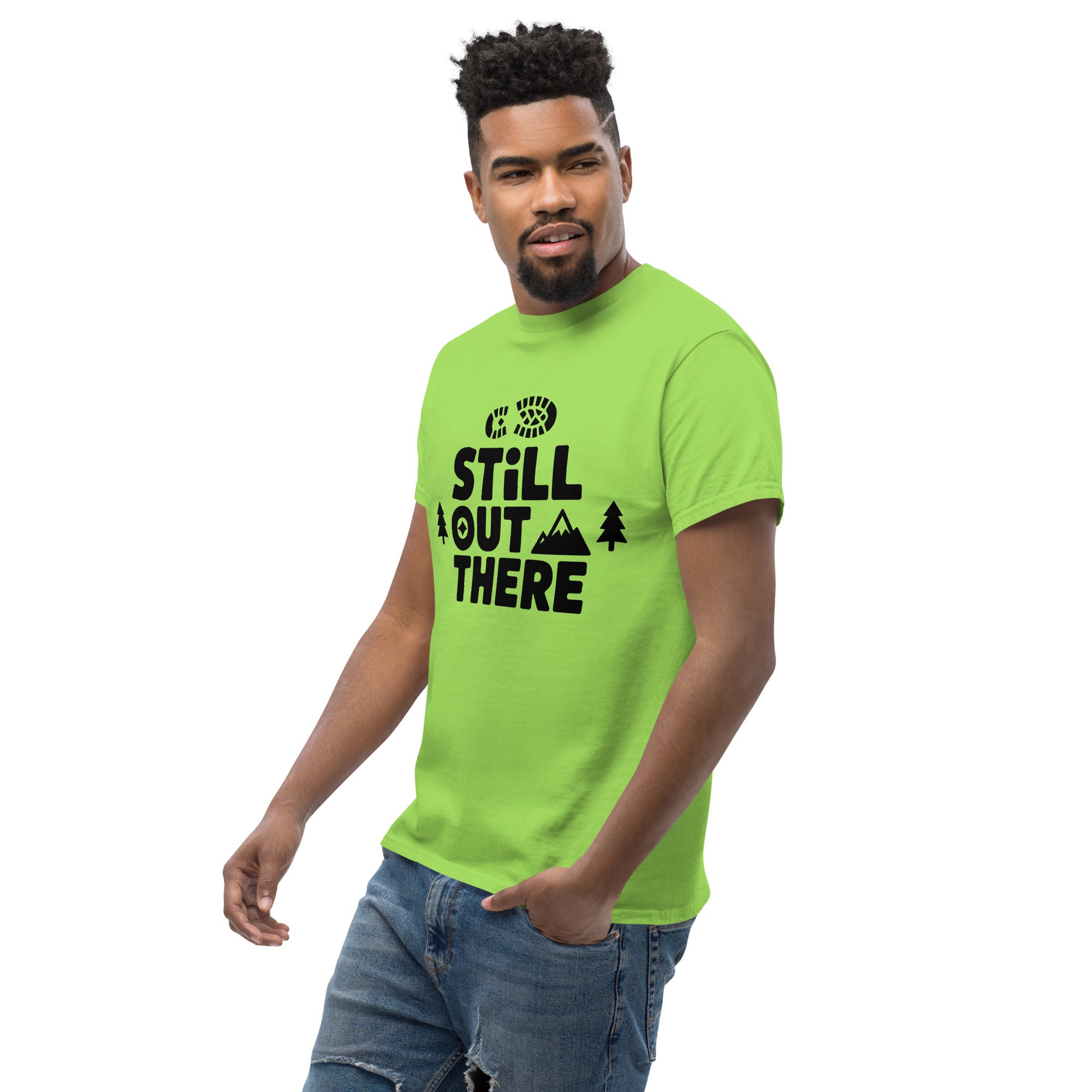 Neon green hiking T-shirt with black "Still Out There" logo graphic on the chest