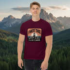 Maroon hiking T-shirt with chest logo graphic featuring mountain silhouette and text.