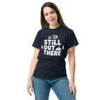 Navy hiking T-shirt with white “STILL OUT THERE” logo and small tree icons