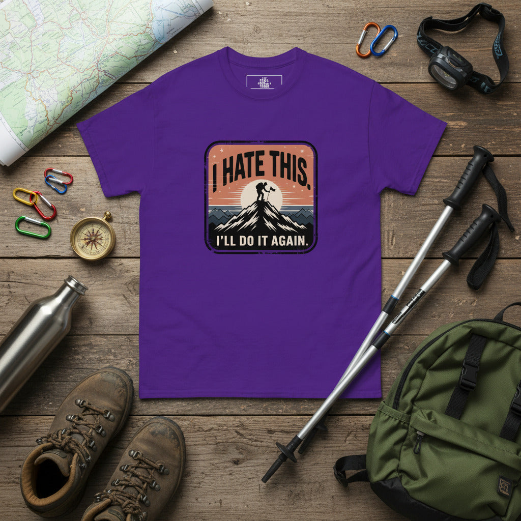 Purple hiking T-shirt with centered chest logo patch and mountain silhouette print.
