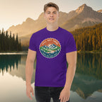Purple T-shirt featuring a circular trail badge graphic on the chest.