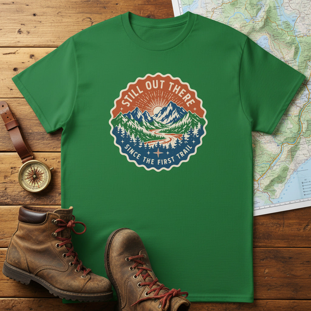 Green hiking t-shirt with circular trail badge graphic at center chest.