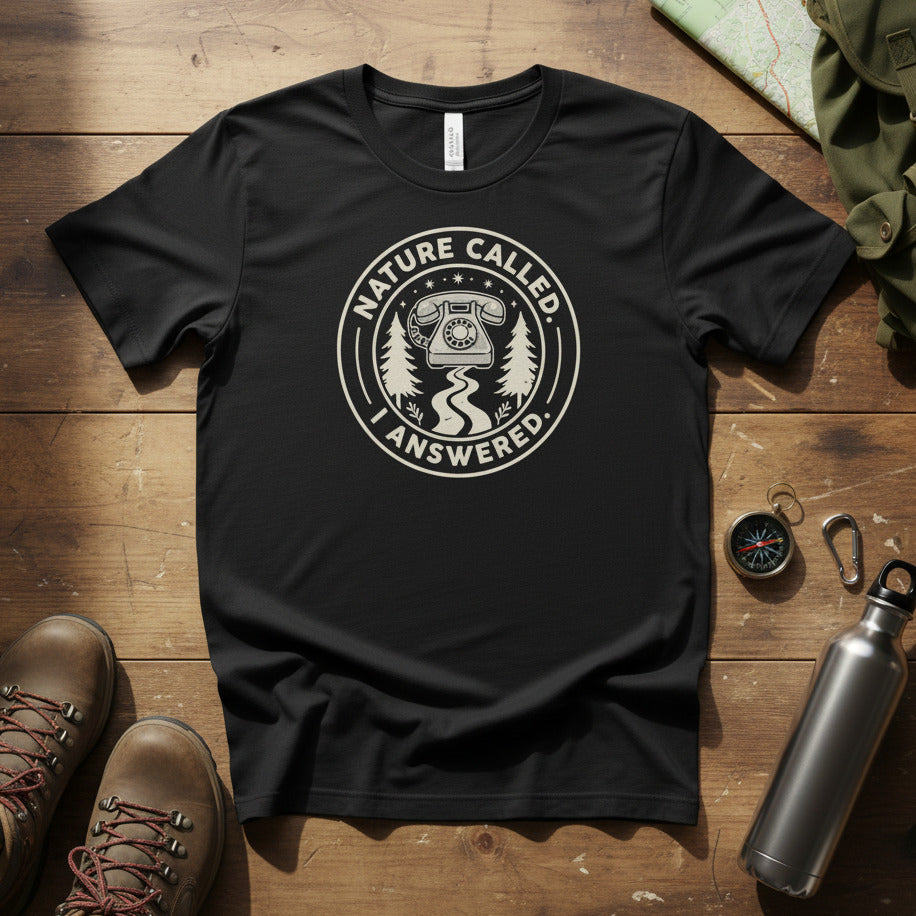 Black camping graphic t-shirt with circular Nature Called I Answered logo print