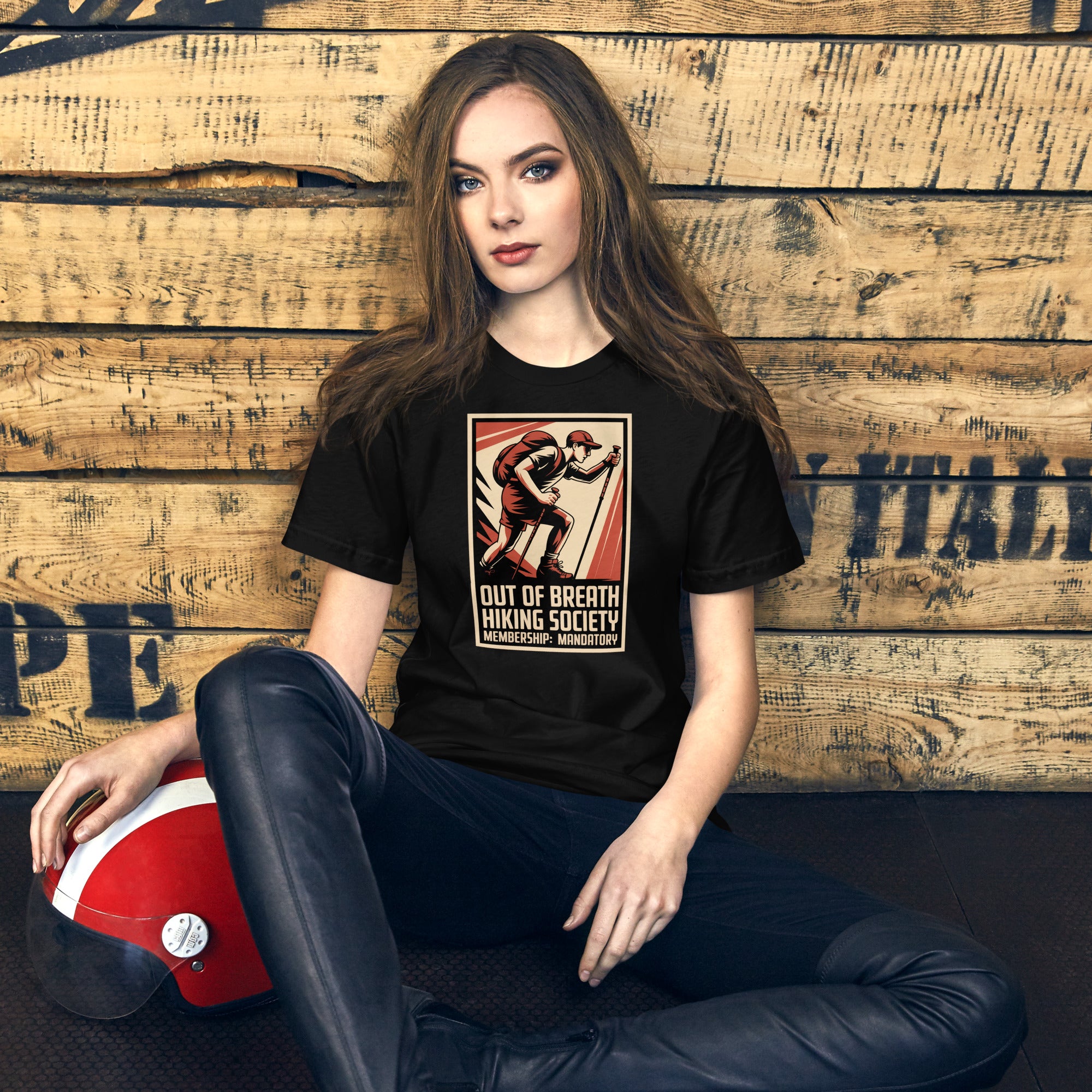 Black T-shirt with retro hiker emblem print and stacked slogan text on chest