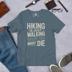 Heather slate gray hiking T-shirt with graphic text: HIKING IS JUST WALKING WHERE YOU MIGHT DIE