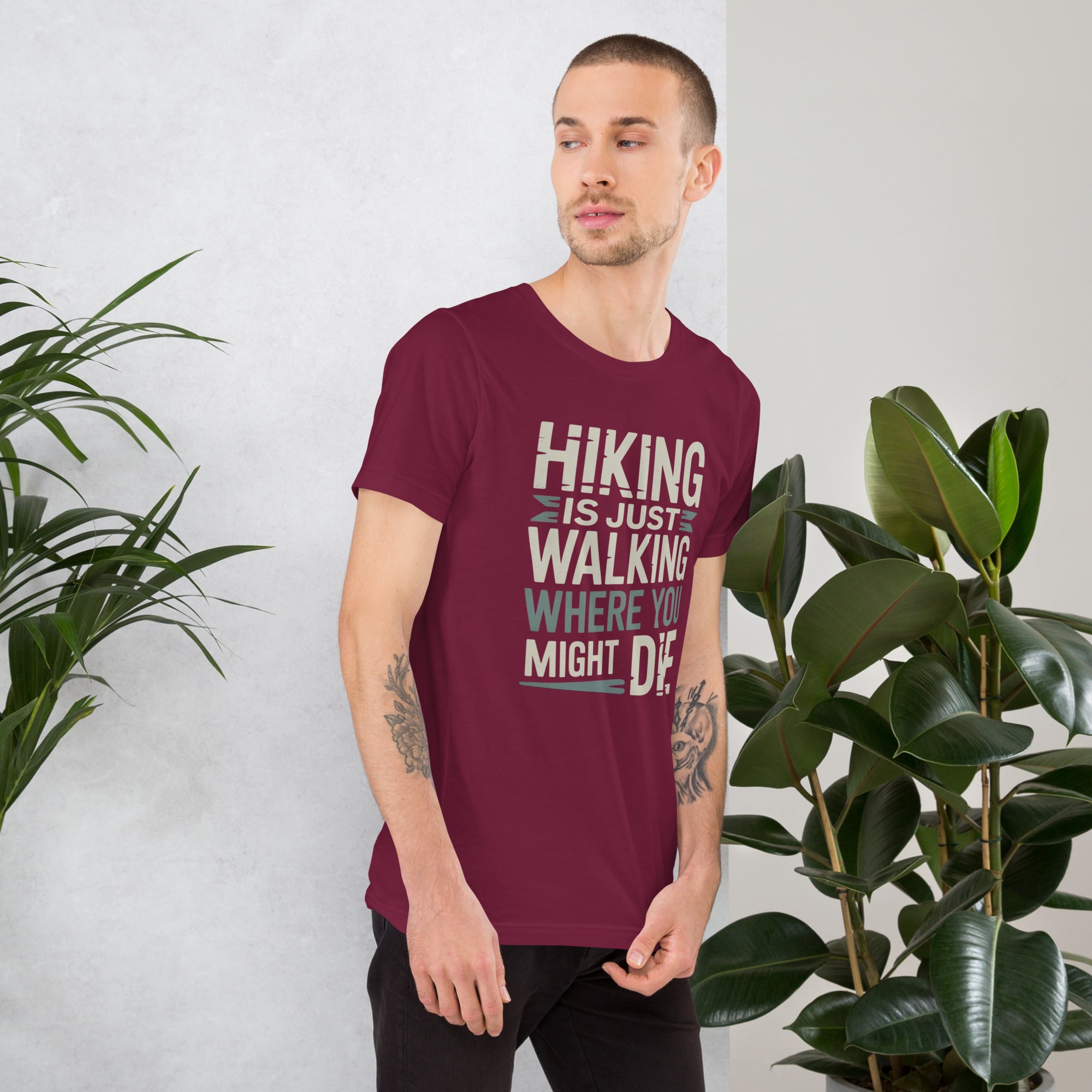 Burgundy funny hiking t-shirt with large 'Hiking is just walking...' chest graphic