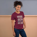 Maroon funny hiking t-shirt with large 'Hiking is just walking...' chest graphic