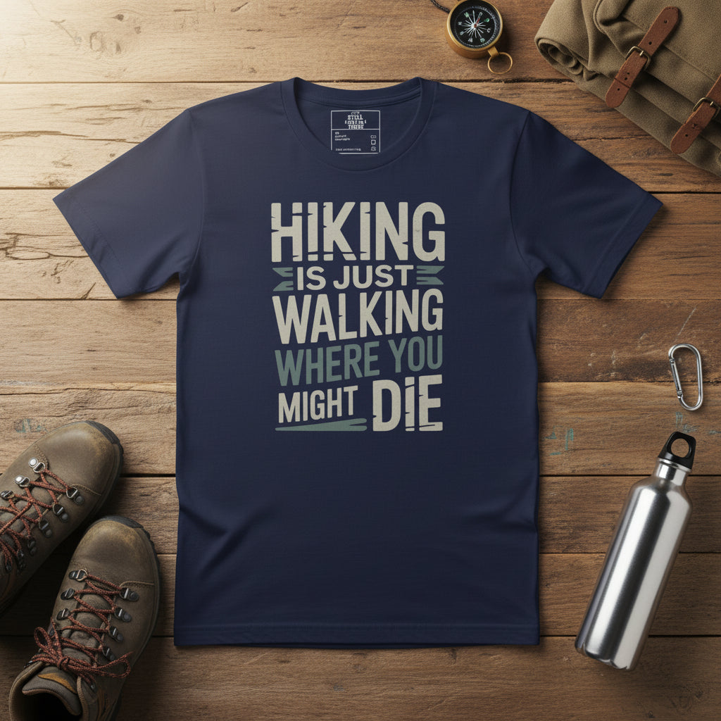 Navy hiking T-shirt with graphic text: HIKING IS JUST WALKING WHERE YOU MIGHT DIE