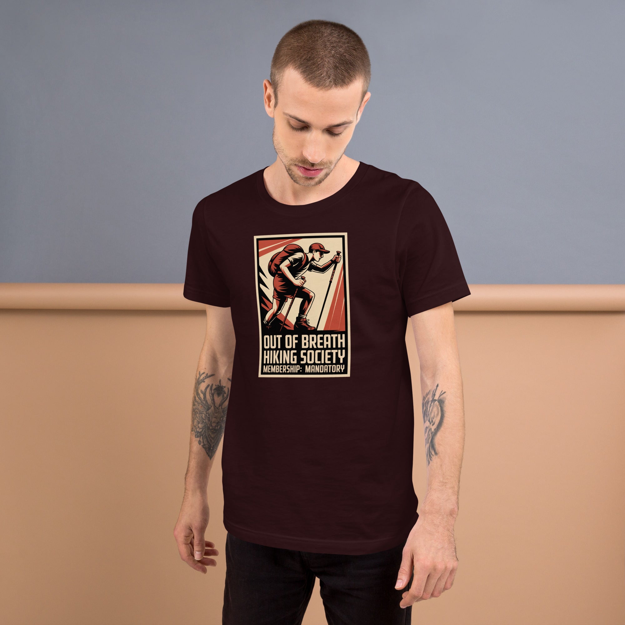 Burgundy T-shirt with retro hiker emblem and “Out of Breath Hiking Society” text