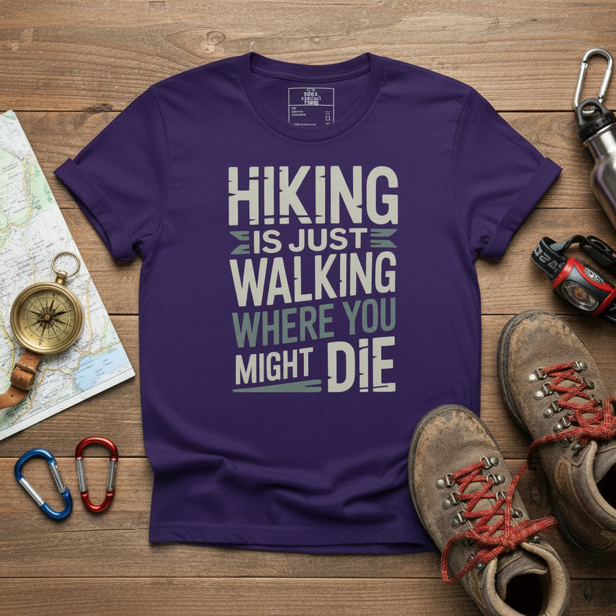 Purple hiking T-shirt with graphic text: HIKING IS JUST WALKING WHERE YOU MIGHT DIE