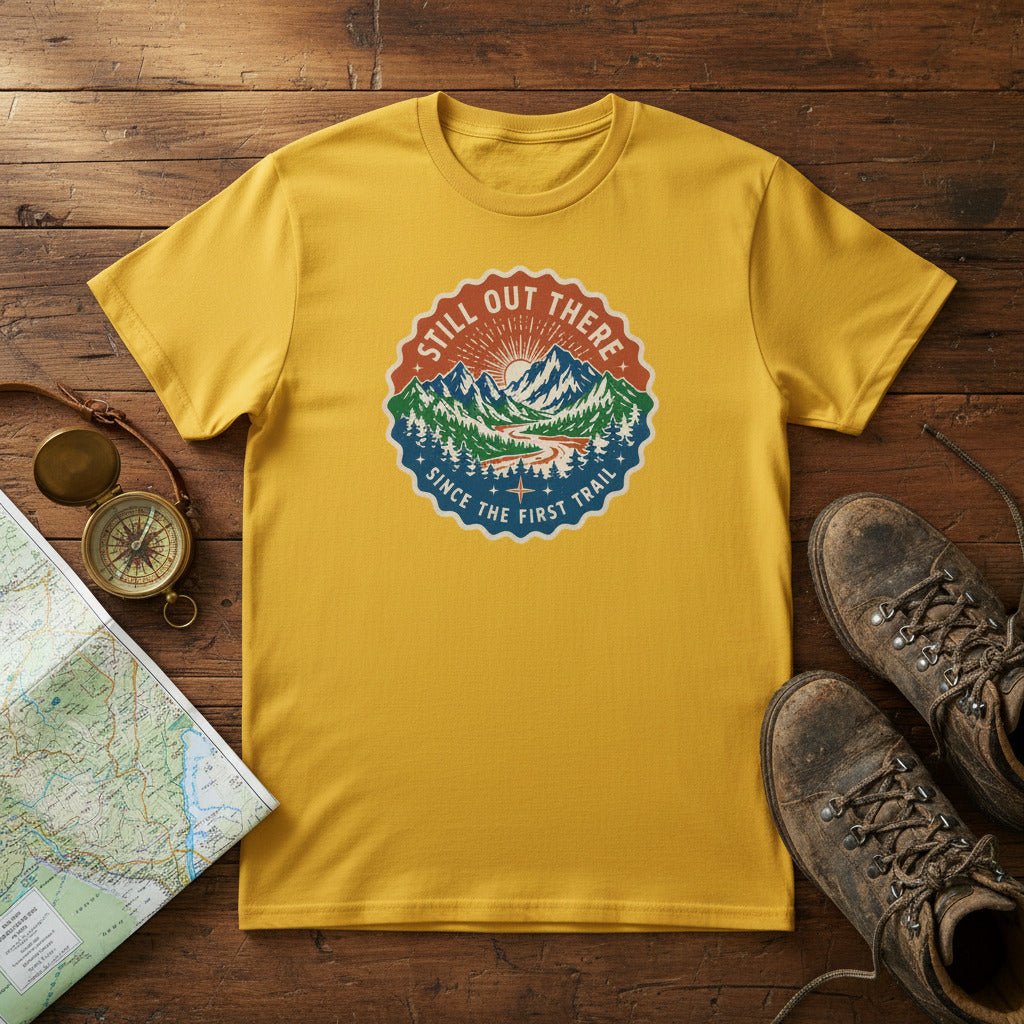 Yellow hiking t-shirt with round vintage trail badge graphic on the chest