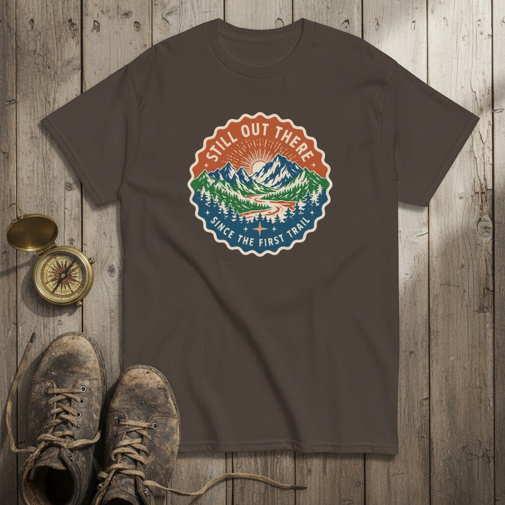 Dark brown hiking t-shirt with round vintage trail badge graphic on the chest